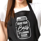 Delantal Aakihi divertido para mujer, negro con bolsillos, ideal para cocinar con estilo.