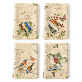 Las toallas Arquiel presentan aves retro para decoración elegante en la cocina.