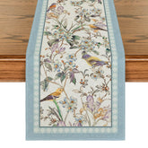Artoid Mode corredor de mesa azul con aves y flores para cenas coloridas.