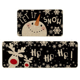 Artoid Mode muneco-nieve-ciervo estera: decoración navideña cálida para la cocina.