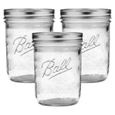 Jarra Ball Mason 16 oz con tapa y banda, ideal para conservas caseras.