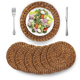 Barien salvamanteles redondo de mimbre natural, protege la mesa y añade calidez natural.