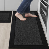 Alfombra BEQHAUSE para cocina antideslizante en negro, protege el suelo y mejora la seguridad.