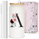 Taza BIPEDS con monograma floral y tapa de bambú, diseño elegante.