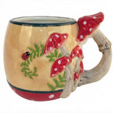Blue Sky Clayworks taza hongo con asa-ramita, ideal para café o té.