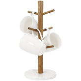Buruis soporte tazas con base de marmol y rama de madera, organizacion elegante.