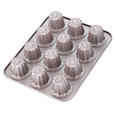 CHEFMADE molde canelé con antiadherente facilita desmoldar con menos aceite.