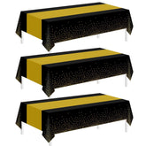 Mantel plástico negro dorado de Childom cubre mesa 54x108 para fiestas.