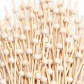 CockStixs palillos de bambú para cócteles, presentación limpia y profesional.