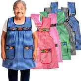 Cuitáxi delantal mexicano tradicional con bordado floral y bolsillos, ideal para la cocina diaria.