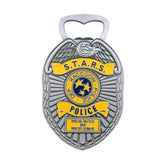 Fanattik Resident Evil emblema policía: abrebotellas con diseño auténtico para coleccionistas.