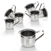 Conjunto de seis cremeras Bell de acero inoxidable para servir leche con elegancia.