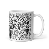 Taza genérica con pene oculto y patrón floral para sorpresa divertida.