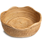 Cesta HITOMEN para pan de ratán redonda, ideal para servir en la mesa.