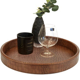 Bandeja redonda HofferRuffer con cuero sintético croco, ideal para presentar bebidas.