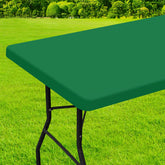 Mantel rectangular Homing con ajuste elástico para mesa estable en exteriores.
