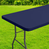 homing mantel rectangular elástico con borde para fijar en mesas plegables al aire libre.