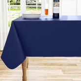 Mantel rectangular Homing de vinilo azul navy protege la mesa durante comidas.