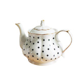 Tetera Jessie estilo europeo en cerámica con calabaza acanalada, perfecta para servir y decorar.
