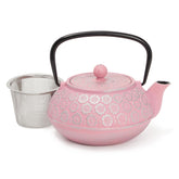 Juvale: tetera de hierro fundido rosa con infusor de acero inoxidable, ideal para tés sueltos.