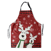 Delantal Kawani navideño con alce y bolsillos, ideal para cocinar.