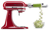 KitchenAid Spiralizer Plus attached to stand mixer making spiralized zucchini ribbons