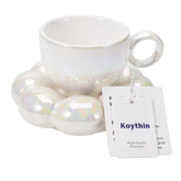 Taza cerámica Koythin con platillo, ideal para café diario en casa u oficina.