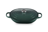 Le Creuset cazo oval esmaltado con tapa Artichaut, cocción uniforme y lista para mesa.