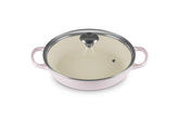 Le Creuset cazuela redonda con tapa de vidrio para cocción uniforme y control visual.
