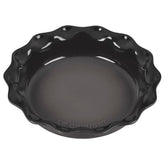 Le Creuset tarta Heritage 9 pulgadas en piedra, horneado uniforme y dorado.