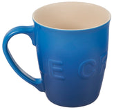 Le Creuset taza logo extralarga Marseille 20oz: agarre cómodo y diseño envolvente para café.
