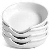 LE TAUCI reposacucharas ceramico blanco en estufa para evitar goteos.