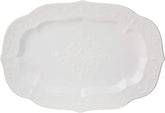 Plato pavo Lenox con borde ondulado, ideal para servir cenas festivas.