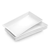 Bandejas rectangulares MALACASA blancas en mesa, ideales para presentar platos con estilo.