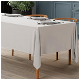 Mantel blanco WEALUXE para mesa rectangular 60x126, aspecto limpio y elegante.
