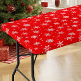 Moosfor mantel elástico con copos de nieve para mesa festiva.