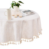 Mantel redondo de MYSKY HOME de 60 pulgadas con borlas beige para un comedor elegante.