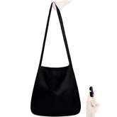 Nanobag bandolera ultraligera plegable negro para compras rápidas.