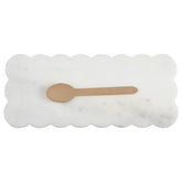 Newtay tabla de mármol blanco con bordes escallados y pies antideslizantes para seguridad en la cocina.