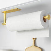 Soporte de papel toalla Niffgaff adhesivo en acabado dorado, instalación rápida.