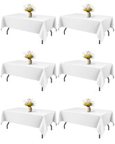 Mantel Niuara blanco rectangular 60x84 para mesas de 5 pies, caída elegante.