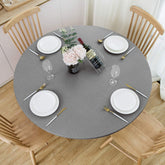 Mantel vinilo redondo NLMUVW con borde elástico gris para ajuste perfecto.