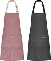 Delantal NLUS para cocina con bolsillos centrales en rayas negras, ideal para cocinar y asar.