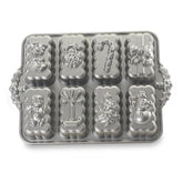 Moldes Nordic Ware para pan mini navideño con diseño de campana, ideal para regalos festivos.