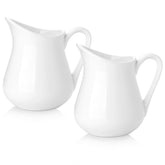 Cremero de Nucookery en cerámica blanco con mango para leche caliente.