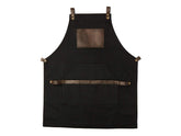 Delantal OLPR negro frente: lona y cuero para cocina profesional.