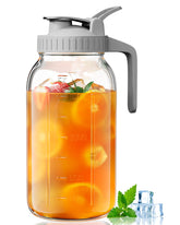 OneDream jarra de vidrio con tapa abatible para servir bebidas sin derrames.