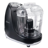 Oster mini picadora 3 tazas con batidora, ideal para trocear verduras rápidamente.
