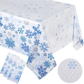 Mantel Oudain con copos de nieve azul y blanco para fiestas, crea ambiente festivo.