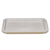 Bandeja OXO de cuarto de horno con recubrimiento cerámico antiadherente facilita desmoldar fácilmente.